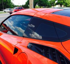 side shot of orange car